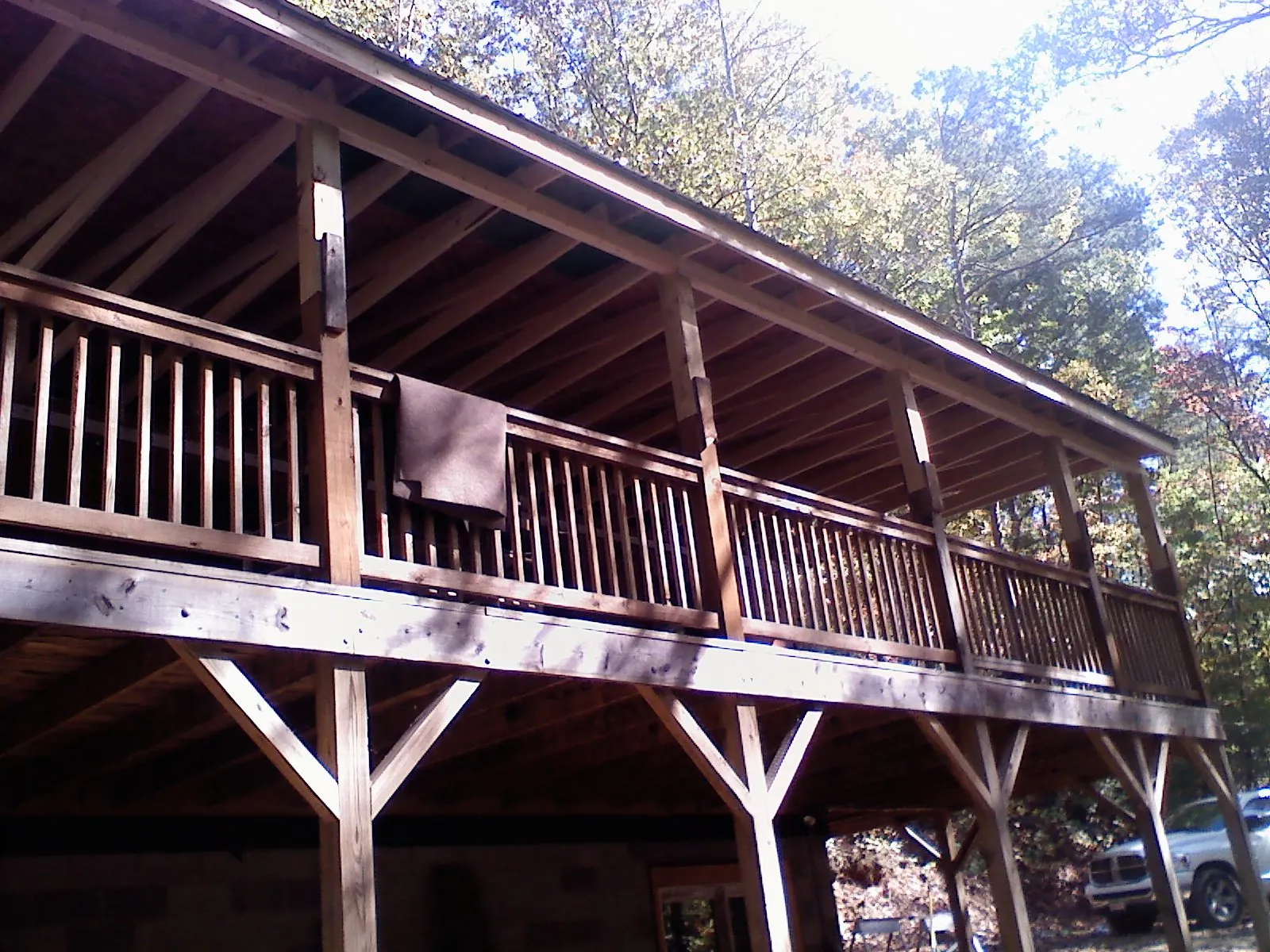 Timber framing under a new elevated porch and deck — Roof Leak Repair in Orange Lake by Roofing Brothers
